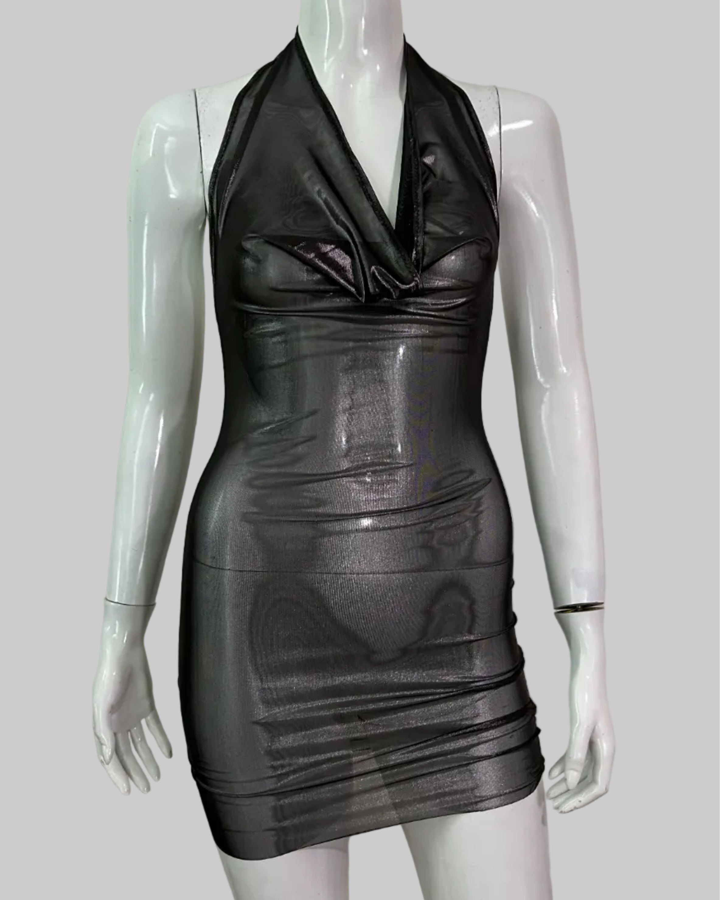 A sleeveless, bodycon mini dress in a shiny black silver metallic mesh material handmade in nyc